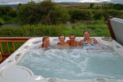 Our riverside hot tub is very popular.