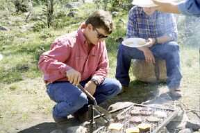 Campfire cooking for lunch.