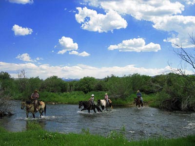 Riding across the Laramie River is lots of fun.